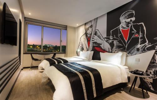 Imagen de la habitación del Hotel Hf Fénix Music. Foto 11