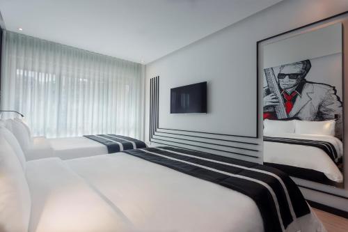 Imagen de la habitación del Hotel Hf Fénix Music. Foto 14