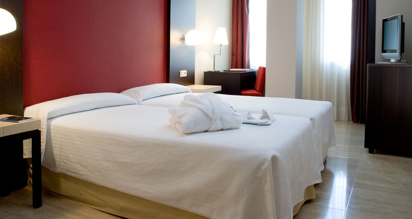 Imagen de la habitación del Hotel Hg City Suites Barcelona. Foto 12