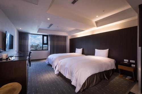 Imagen de la habitación del Hotel Hi- Branch Chui-yang. Foto 7