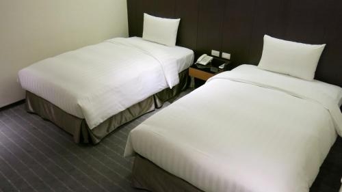 Imagen de la habitación del Hotel Hi- Branch Chui-yang. Foto 8