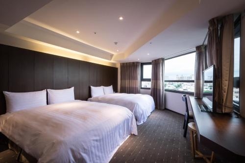 Imagen de la habitación del Hotel Hi- Branch Chui-yang. Foto 9