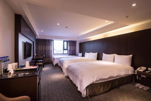 Imagen de la habitación del Hotel Hi- Branch Chui-yang. Foto 10