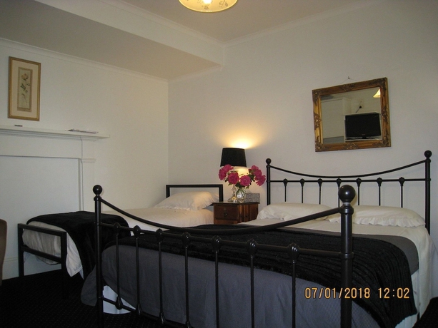 Imagen de la habitación del Hotel Hi George Bed and Breakfast. Foto 10