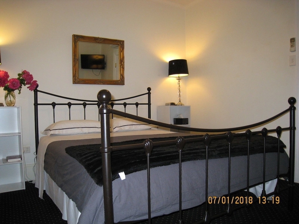 Imagen de la habitación del Hotel Hi George Bed and Breakfast. Foto 11