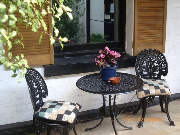 Imagen de la habitación del Hotel Hi George Bed and Breakfast. Foto 15