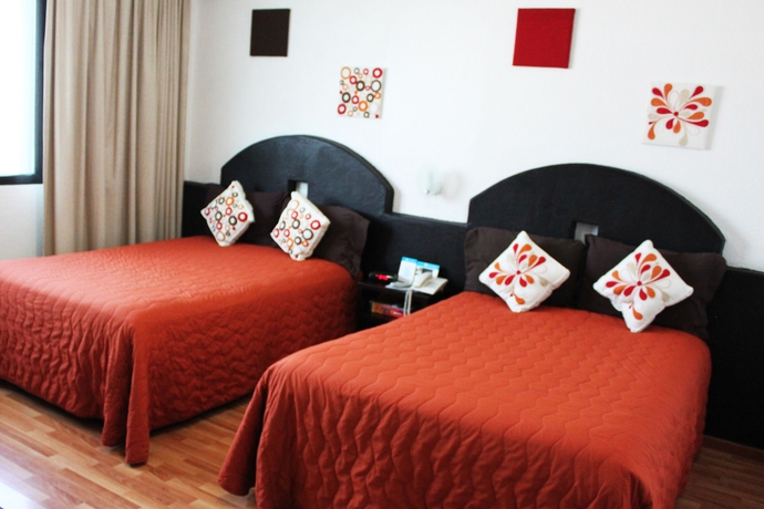 Imagen de la habitación del Hotel Hi Impala. Foto 11