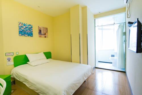Imagen de la habitación del Hotel Hi Inn Dalian Airport. Foto 2