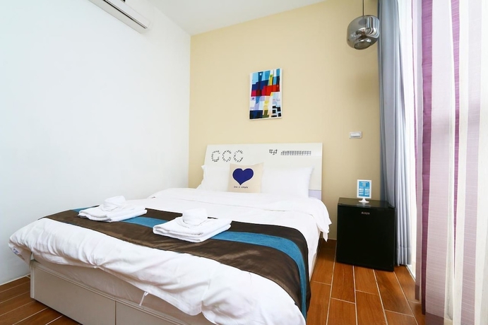 Imagen de la habitación del Hotel Hi Inn. Foto 4