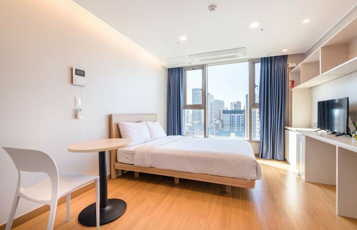 Imagen de la habitación del Hotel Hi Residences. Foto 11
