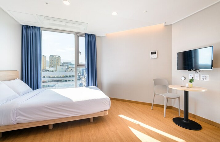 Imagen de la habitación del Hotel Hi Residences. Foto 12
