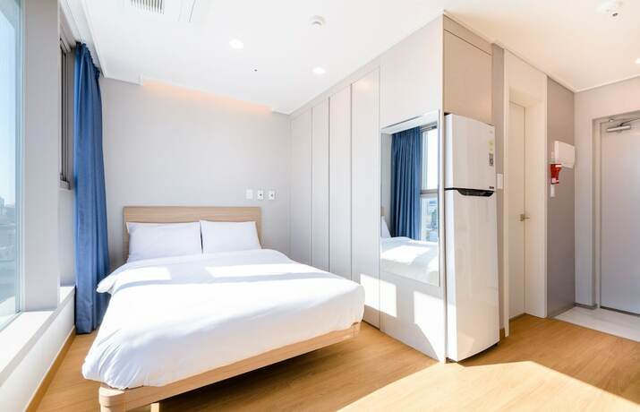 Imagen de la habitación del Hotel Hi Residences. Foto 14