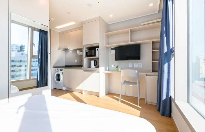 Imagen de la habitación del Hotel Hi Residences. Foto 15