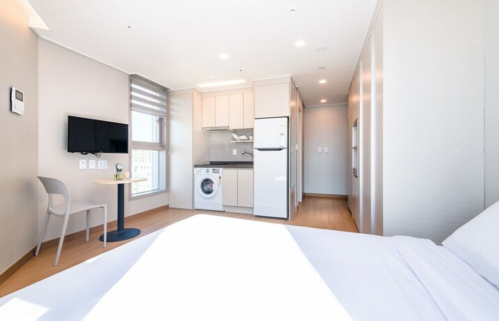 Imagen de la habitación del Hotel Hi Residences. Foto 16