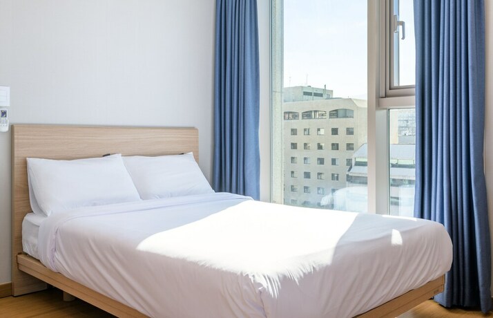 Imagen de la habitación del Hotel Hi Residences. Foto 18
