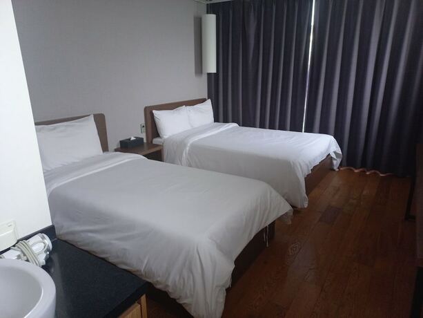 Imagen de la habitación del Hotel Hi, Seogwipo. Foto 12