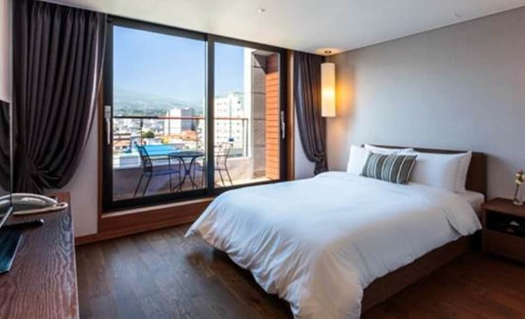 Imagen de la habitación del Hotel Hi, Seogwipo. Foto 17