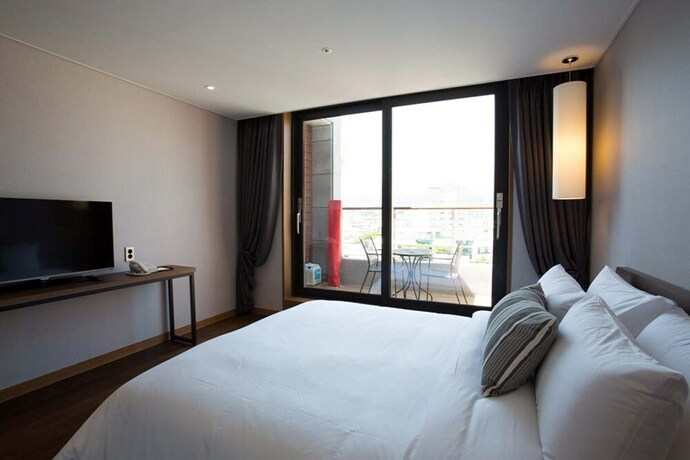Imagen de la habitación del Hotel Hi, Seogwipo. Foto 19