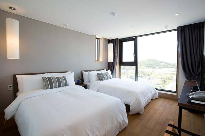 Imagen de la habitación del Hotel Hi, Seogwipo. Foto 23