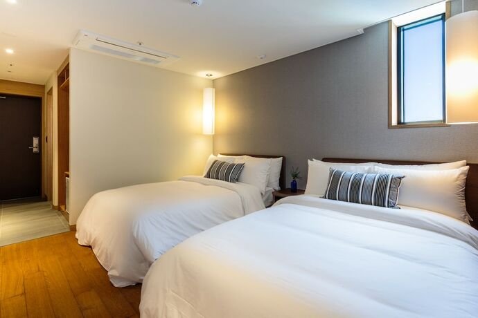 Imagen de la habitación del Hotel Hi, Seogwipo. Foto 27