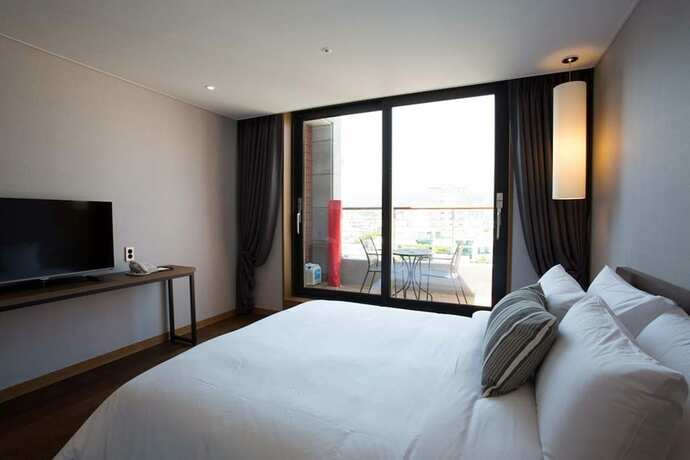 Imagen de la habitación del Hotel Hi, Seogwipo. Foto 29