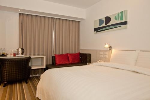 Imagen de la habitación del Hotel Hi - Xinmin. Foto 6