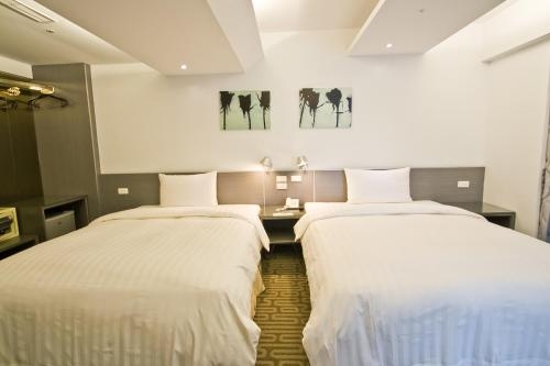 Imagen de la habitación del Hotel Hi - Xinmin. Foto 7