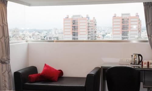Imagen de la habitación del Hotel Hi - Xinmin. Foto 9