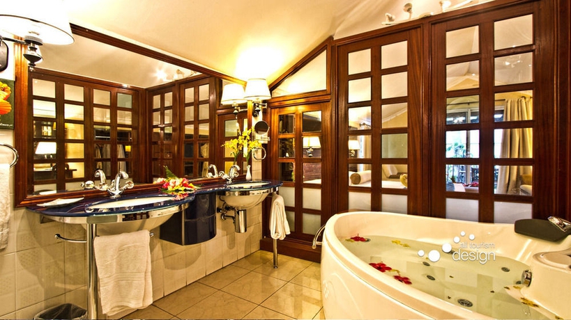 Imagen de la habitación del Hotel Hibiscus Boutique. Foto 8