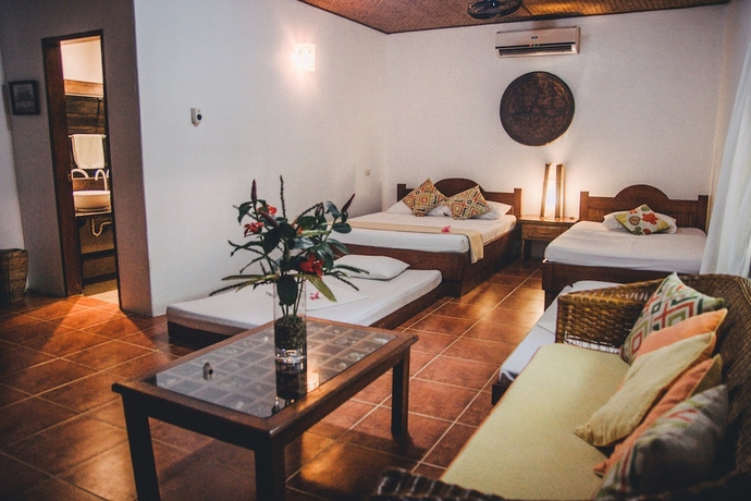 Imagen de la habitación del Hotel Hibiscus Garden Inn. Foto 2