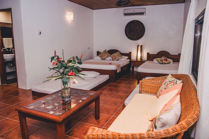 Imagen de la habitación del Hotel Hibiscus Garden Inn. Foto 3