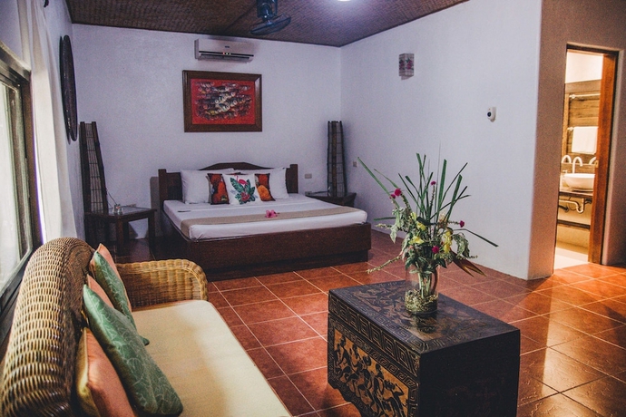 Imagen de la habitación del Hotel Hibiscus Garden Inn. Foto 4