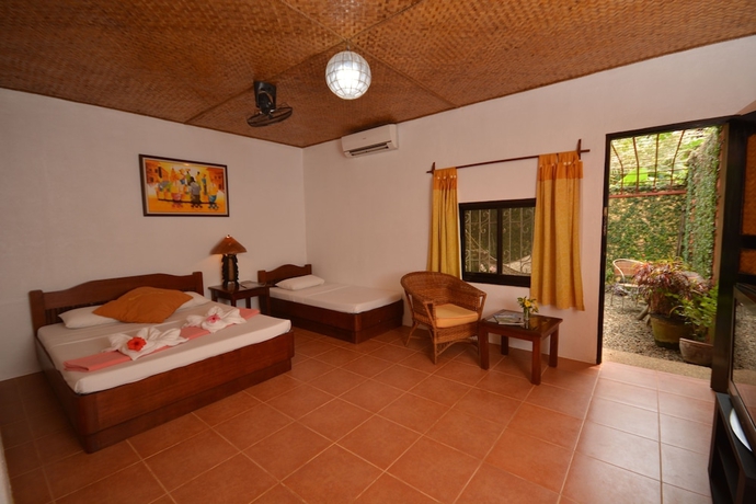 Imagen de la habitación del Hotel Hibiscus Garden Inn. Foto 9