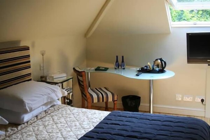Imagen de la habitación del Hotel Hickman Hill. Foto 17