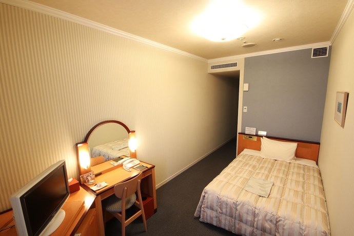 Imagen de la habitación del Hotel Hida Plaza. Foto 2