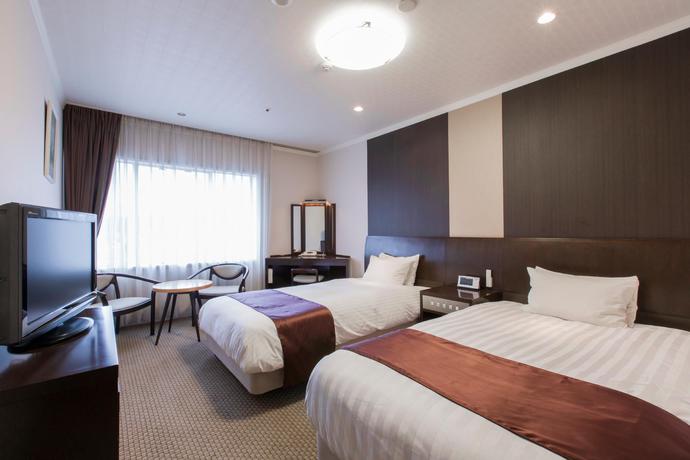 Imagen de la habitación del Hotel Hida Plaza. Foto 5