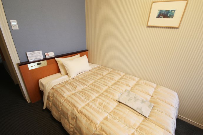 Imagen de la habitación del Hotel Hida Plaza. Foto 10