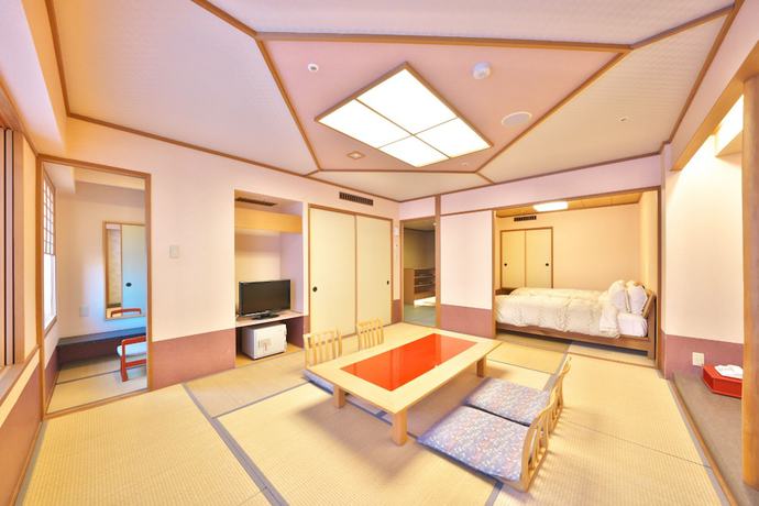 Imagen de la habitación del Hotel Hida Plaza. Foto 11