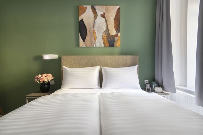 Imagen de la habitación del Hotel Hidden Art Boutique Residence. Foto 10