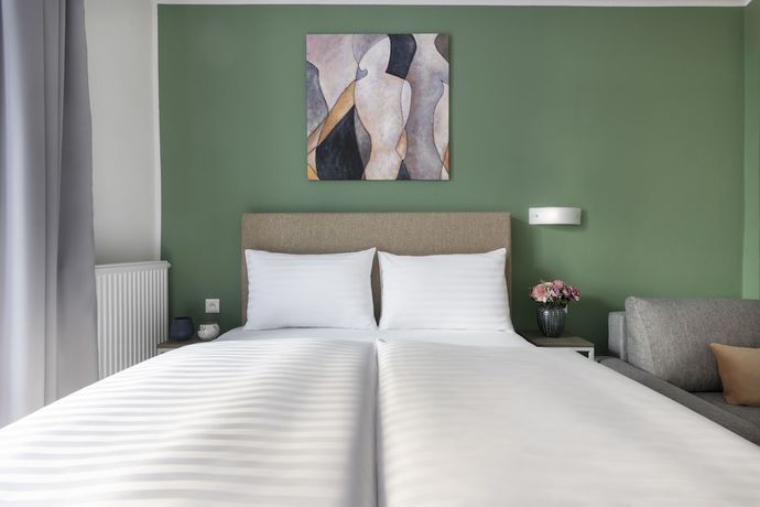 Imagen de la habitación del Hotel Hidden Art Boutique Residence. Foto 19