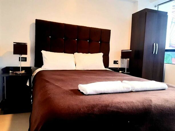 Imagen de la habitación del Hotel Hidden Garden. Foto 15