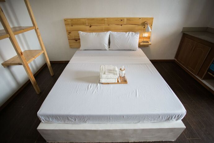 Imagen de la habitación del Hotel Hidden Lagoon Resort. Foto 16