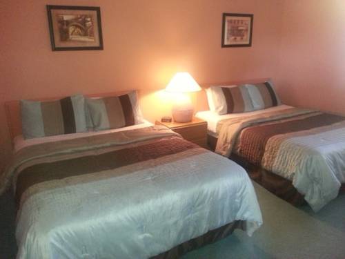 Imagen de la habitación del Hotel Hidden Palms Resort and Condominiums. Foto 16