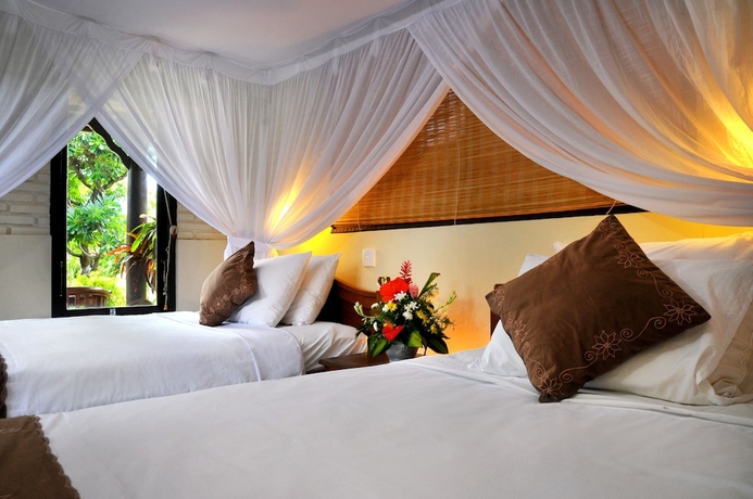 Imagen de la habitación del Hotel Hidden Paradise Cottages. Foto 3