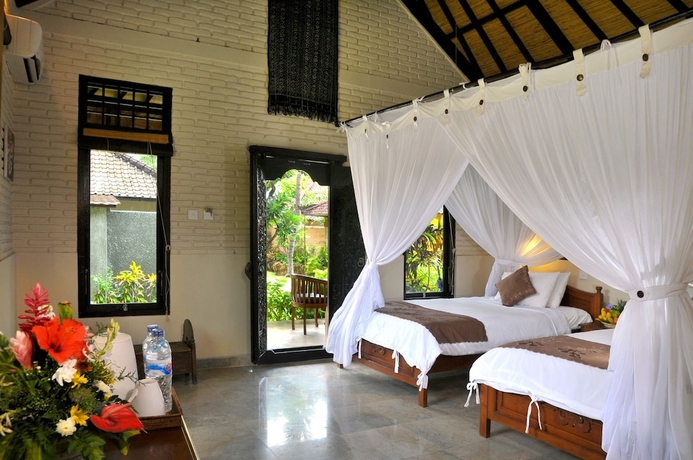 Imagen de la habitación del Hotel Hidden Paradise Cottages. Foto 11