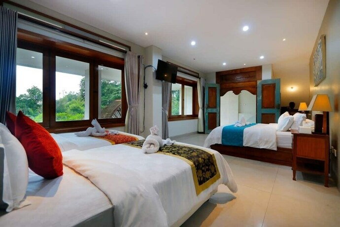 Imagen de la habitación del Hotel Hidden Seroja Villa. Foto 12