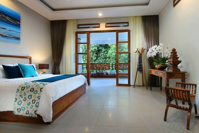 Imagen de la habitación del Hotel Hidden Seroja Villa. Foto 38