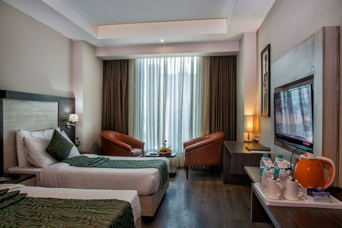 Imagen de la habitación del Hotel Hide Away Suites. Foto 20