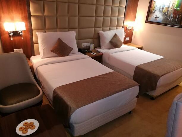 Imagen de la habitación del Hotel Hide Away Suites. Foto 25