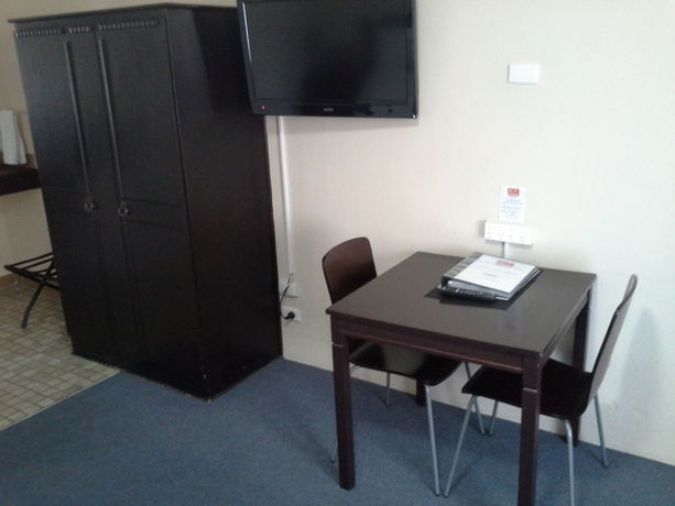 Imagen de la habitación del Hotel Hideaway Motor Inn. Foto 6